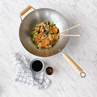 The Ultimate Guide to Cooking with a Wok: Tips and Must-Know Techniques